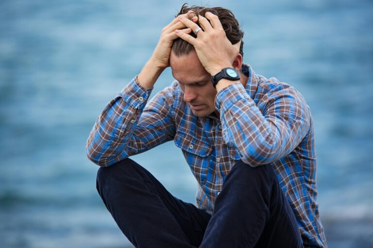 man with dental anxiety contemplating if he should see our San Bruno dentist
